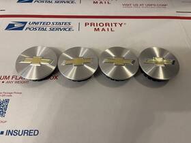 Chevrolet 580.gm1e12 11-15 Set Of 4 Caps Oem Used 9594