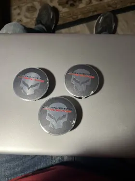 19331659 General Motors 2014-2019 Corvette C7 Gm Black Jake Skull Wheel Center Caps Set Of 3