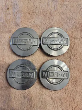 40342-53f00 Nissan Used Set Of 4 Wheel Center Caps Part 40342 53f00 2 Inch Wide