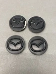Genuine Mazda Alloy Centre Cap (l # 635) 2477 Used. Price: $19.99.