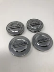 2009-2015 Nissan Altima Rogue Quest Murano Center Wheel Caps 40343AU51A Pack Used. Price: $17.70.