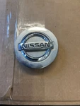 Nissan Center Cap (P8565) # WCA-209 S311-31. Chrome Used. Price: $34.19.