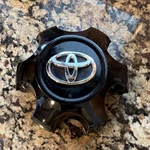 Wheel Center Cap- Toyotapart Number -2608-04090 Used- Good Condition. Price: $35.00.