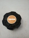 Mazda B2600I S232 37 191 Oem Wheel Center Rim Cap Hub Cover Black Bronze Used. Price: $26.00.