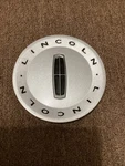 2003 2011 Lincoln Zephyr Mkz Silver Center Cap 5W13-1A096-AB Used. Price: $30.00.