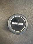 Mazda Truck Center Cap (B11392) # F27A-1A097-BA Used. Price: $53.19.