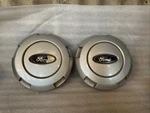 2004-2008 Ford F150 Center Caps Set Of Oem # 4L34-1A096-AC / 4L3J-1A096-AA Used. Price: $35.00.