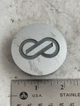 Enkei Wheels Gunmetal And Silver Rim Hub Cover Center Cap 00041-12980 Used. Price: $13.50.
