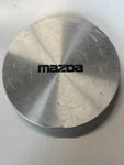 Genuine Mazda 1989-1991 Wheel Hub Center Cap 929 / Mpv LA02-37-190A Used. Price: $10.00.