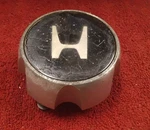 Honda Passport : 1998, 1999, 2000, 2001, 2002, 5", X 5/8" Tall, Center Cap Used. Price: $14.00.
