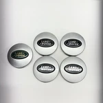 Land Rover Range Center Caps Set 5 Off 01 Hse Used. Price: $45.00.