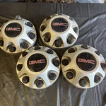 Set Of (4) Gmc Wheel Center Cap Lugs GMT-10-04 C/n 9597819 Used. Price: $79.99.