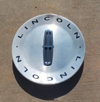 Lincoln Ls Center Cap 2003-2005, Machined Aluminum, Part Number 2W43 1A096 Bc 10 Used. Price: $24.95.