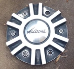 Veloche Custom Wheel Center Cap, Black And Silver, Part Number C10295B 03 Used. Price: $24.95.