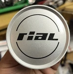 Rial Center Cap Wheel Hub Cover Silver With Black Writing N12 Used. Price: $29.99.