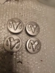 Genuine Oem Dodge Charger Grand Caravan Stratus Magnum 04782764AA Center Caps Used. Price: $14.99.