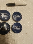 Set Of (4) Four Ford Fusion Focus Fiesta Escape Edge Oem Center 6M21-1003-AA Used. Price: $16.00.