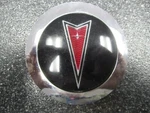 One (1) Oem 1987-1988 14" Pontiac 6000 Emblems 7087-C4 14100073 5090 3.25" Used. Price: $25.00.
