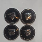 Center Cap - Styled Steel Wheel Black Mercury Man Logo New. Price: $50.00.