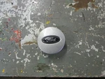 One Gray Center Fits Escape 193308 Used. Price: $30.00.