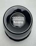 *used American Racing Gloss Black Push Thru Wheel Center Cap 1425002GB. Price: $15.99.