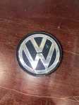7M7601165 (700601165) Volkswagon Center Cap (1 Clip Broken) Used. Price: $13.95.