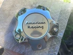 New American Racing Custom Wheel Center Chrome # 6193-1455-CAP CARB1455CH. Price: $13.95.