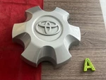 #a 1) 2024-2025 Toyota Tacoma Silver Center Cap 4260B-AK010 Used. Price: $69.95.