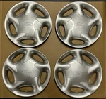 Set Of Nos Oem 1993-1997 Ford Probe 14" Directional R/l Hubcaps Wheel Covers New. Price: $100.00.