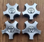 Toyota Solara Center Cap Set Of 4, 1999-2003, Metal Clip, Part Number 69378 Ss Used. Price: $54.95.