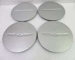 Ford Thunderbird 1993-1996 Silver Center Caps Set 3742 F4SC-1A096-AA Oem New. Price: $125.00.