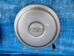 1997 Ford Escort Silver 14" Steel Wheel Center Cap Hub # F7C6-1A096-BB Used. Price: $8.40.