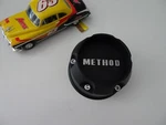 New Method Black Custom Wheel Center Cap # CP-1717B127-S1. Price: $54.59.