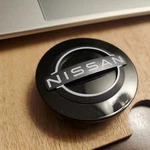 Full Set Of Genuine Nissan Black Wheel Center Cap Oem Part #40342-6TA1A Used. Price: $85.00.