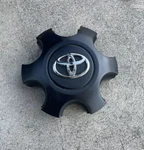 2016 2020 2021 2022 Toyota Tacoma Matte Black Oem Center Cap P/n 42603-YY290 Used. Price: $32.99.