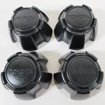 1985-1990 4X2 Toyota Pickup # 69199 14" Steel Wheel Black Center Caps SET/4 Used. Price: $109.99.