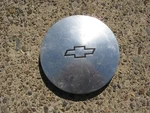 One Chevy Cavalier Hubcap Center 716827 Used. Price: $7.92.