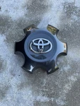 2016 2019 2020 Toyota Tacoma Oem 75193 Charcoal Center Hub Cap 4260B-04060 Used. Price: $32.99.