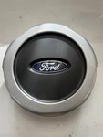 Ford Center Cap 4L24-1A096-AA Used. Price: $35.00.