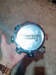 1) American Racing Wheels Chrome Center # CAP-AX204-FRONT-B S1710-12 Used. Price: $33.00.
