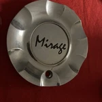 Mirage Chrome Wheel Center Cap F-343 Used. Price: $35.00.