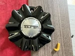 #j 1) Touren Black Center Cap C10220-2 5301770 Used. Price: $19.95.