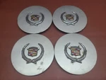 1987 - 1992 Cadillac Allante Alloy Wheel Center (set 4) Hubcaps Used. Price: $99.99.