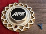 #y 1) Are American Racing Gold & Aluminum Wheel Center Cap 6 5/8" 899097 899098 Used. Price: $15.95.