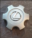 Fits 2003-2009 Lexus GX470 Oem Silver Center Cap 74167 1PC Used. Price: $21.95.