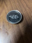 Buick Riviera Wire Hub Cap Center (P8407)) 1085 1099 Used. Price: $24.69.