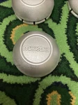 Oem Mazda Center Hub Cap Painted Silver F47A-1A096-DA F47A1A096DA 1PIECE Used. Price: $15.00.