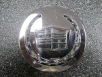 One (1) Cadillac Regency Chrome Center 89-0101-CAP 51511880-F3 2-7/8" Used. Price: $35.00.