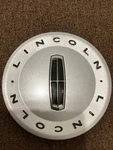 2003 2011 Lincoln Zephyr Mkz Silver Center Cap 5W13-1A096-AB Used. Price: $30.00.