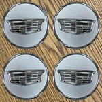 2 5/8" Cadillac Lyriq, XT4 Oem Silver Center Cap #84638166 Set New. Price: $54.99.